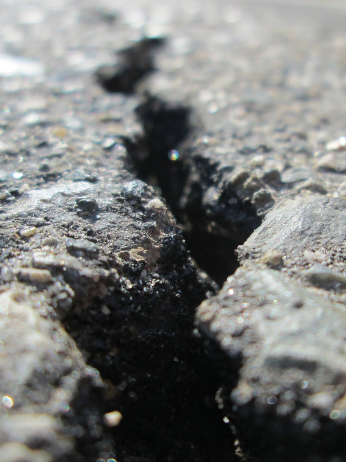 Asphalt-Risssanierung Arbeitsfotos Astek